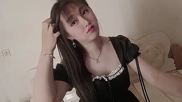 הופעת וובקאם של mimi-yangyang