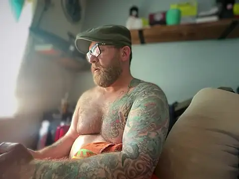 Tattooednakedguy: διαδικτυακό σόου στην κάμερα