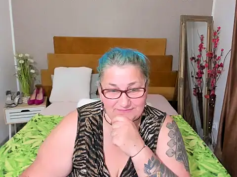 Show modela Sugarmommy_69X na web-kameri