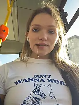 StreetSquirt - boobs out+take off pants in library
