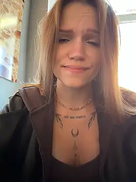 StreetSquirt - take off top, book bra in library